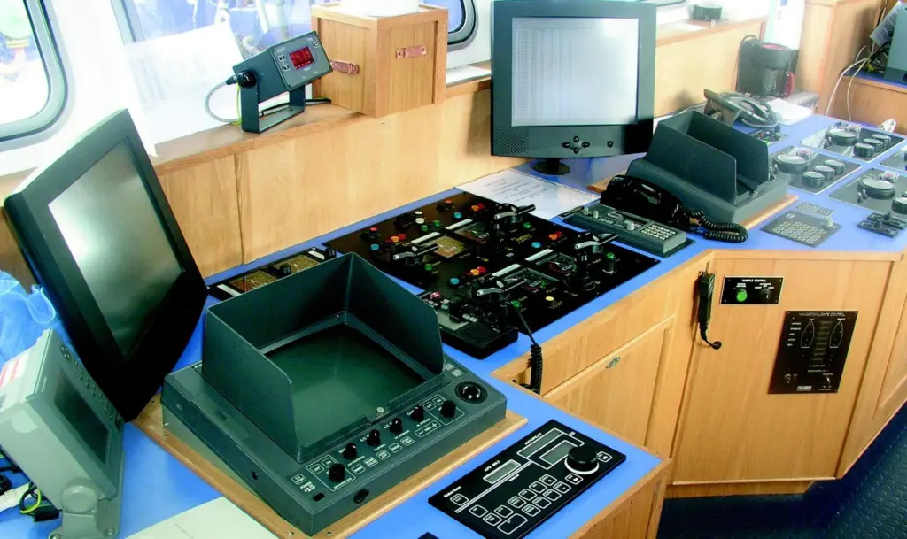 The 96 wheel MPV transporter vehicle withdraws leaving the wing and its jig in place on the deck.