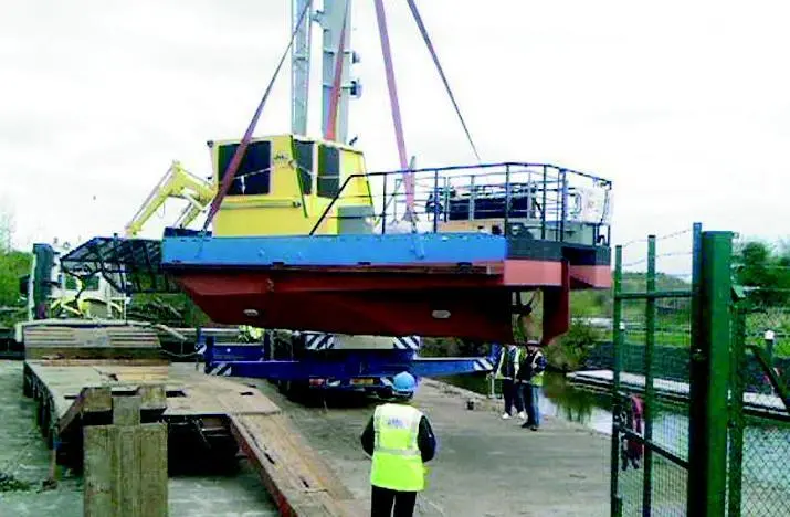 Having successfully completed trials, Dollaghan is placed on a low loader for transport to Coleraine.