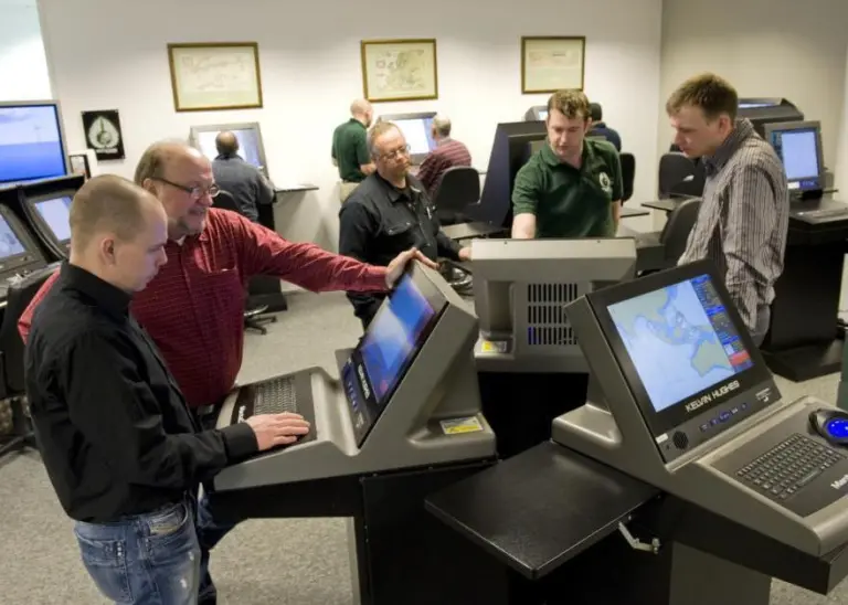 Experienced ECDIS navigators delivering type specific training on various systems.