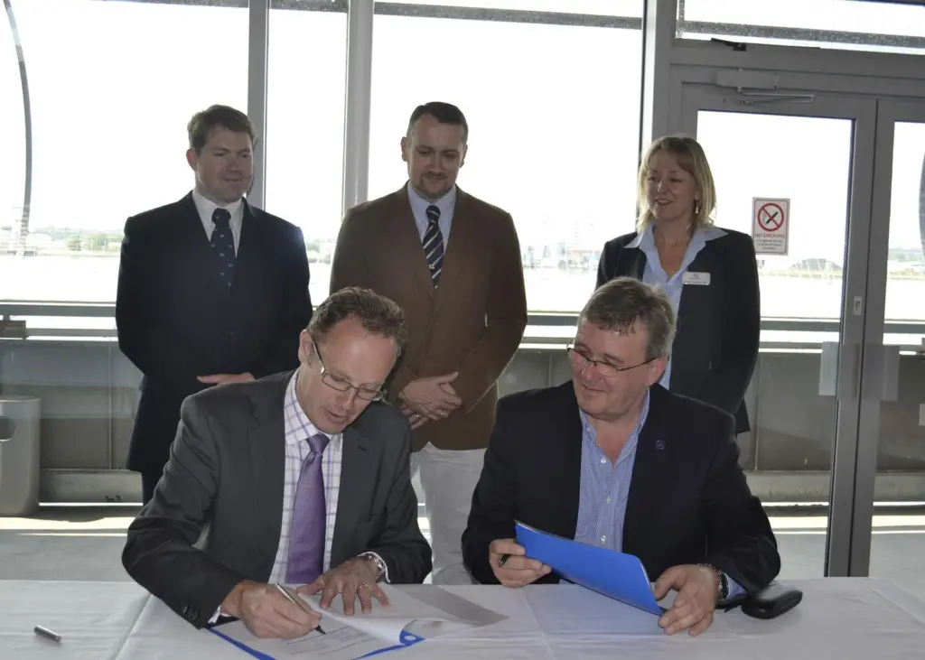 Caption:  Left to right: David Brook – Director RNLI , Charlie Mill, MD Ocean Safety. Back row:L to r: Shaun Botha, Buyer, RNLI, Allen Stevens,Senior Engineer, RNLI, Mandy Boughton, Business Development Manager, Ocean Safety