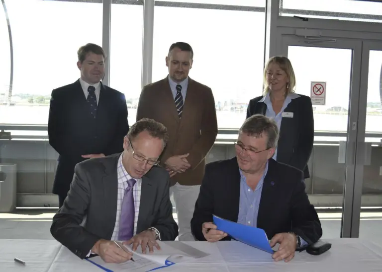 Caption:  Left to right: David Brook – Director RNLI , Charlie Mill, MD Ocean Safety. Back row:L to r: Shaun Botha, Buyer, RNLI, Allen Stevens,Senior Engineer, RNLI, Mandy Boughton, Business Development Manager, Ocean Safety