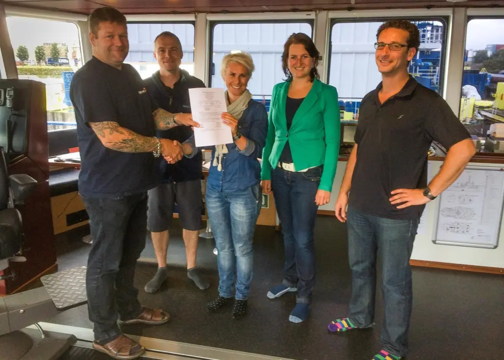 Stemat staff with one of the certificates and a diverse collection of sockwear