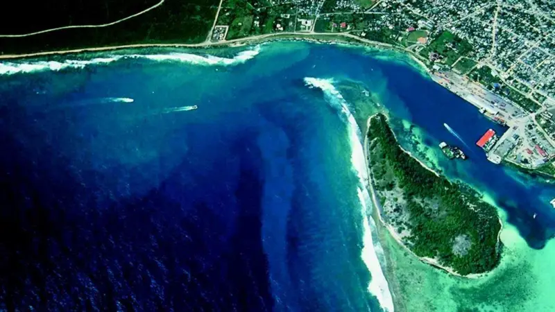 Coral reefs cause complications for designers of the deepwater port in the Dominican Republic.
