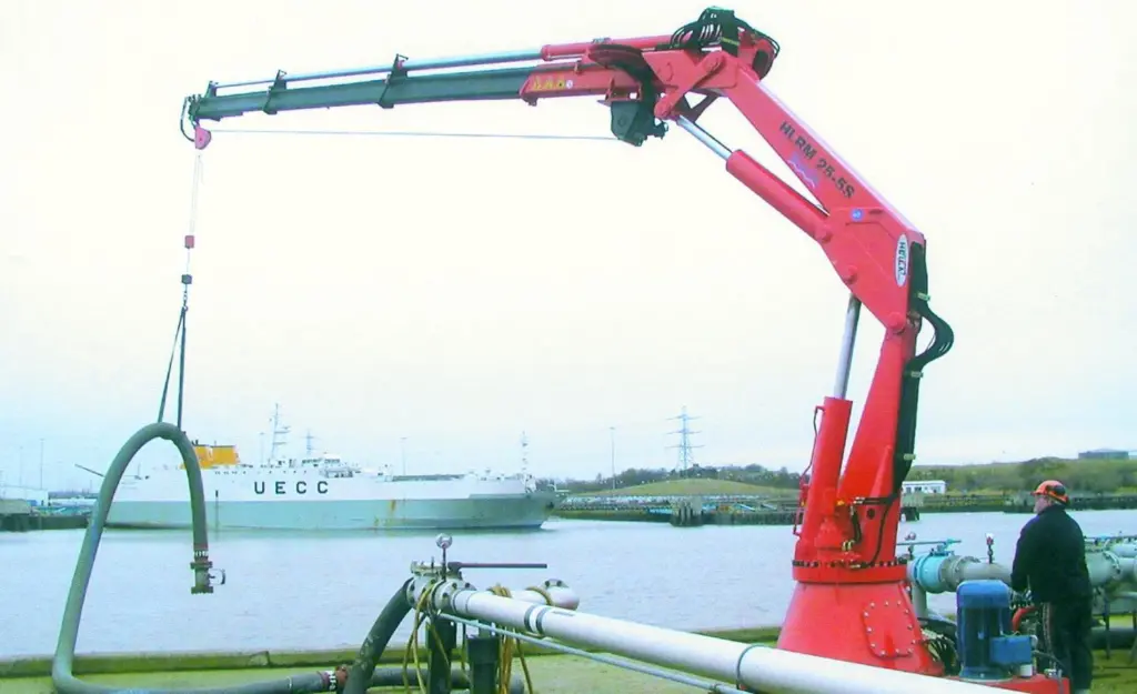 A dock terminal operator tries out the hose handling capability of the newly installed Heila marine crane at Northumberland Dock.