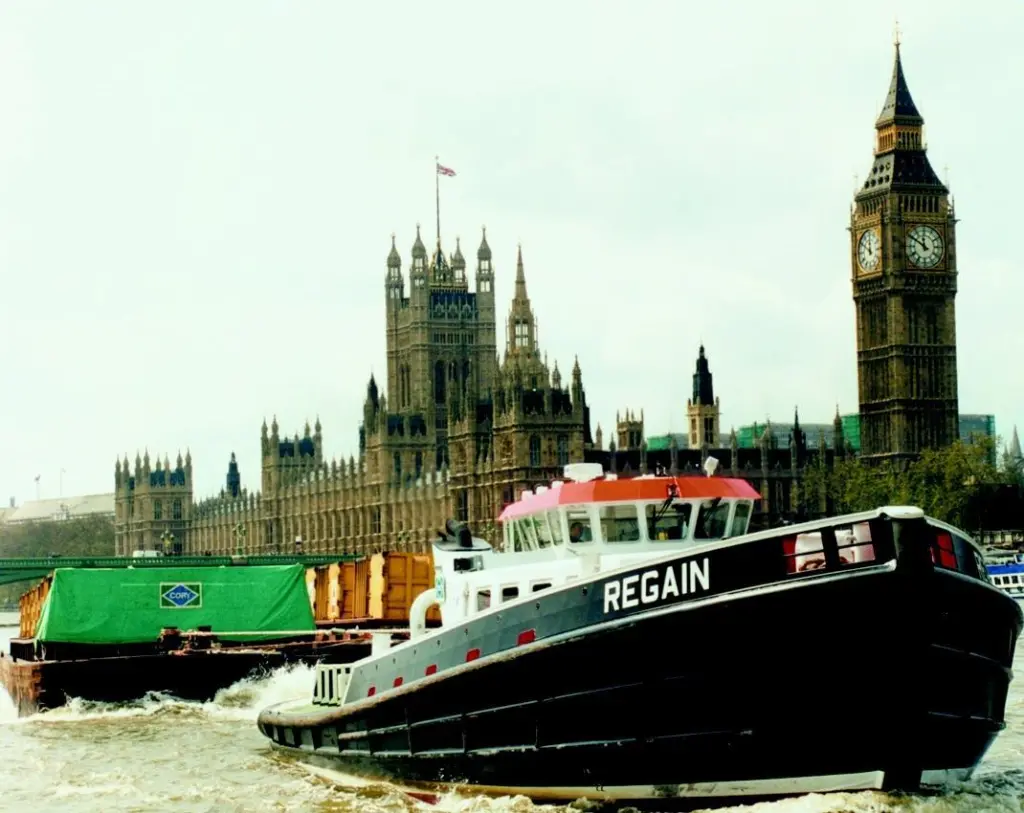 Regain tows refuse barges downriver for Cory Environmental.