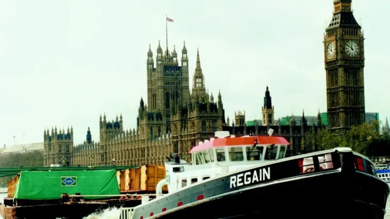 Regain tows refuse barges downriver for Cory Environmental.