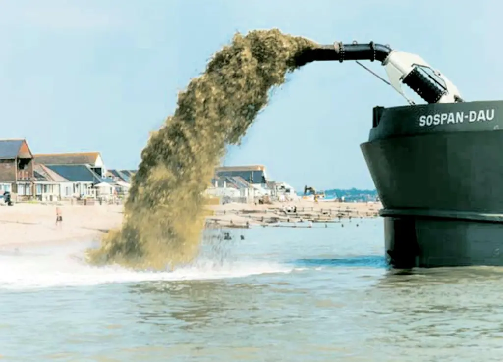 Westminster Dredgings Sospan Dau rainbows shingle onto a Pevensey Bay beach.