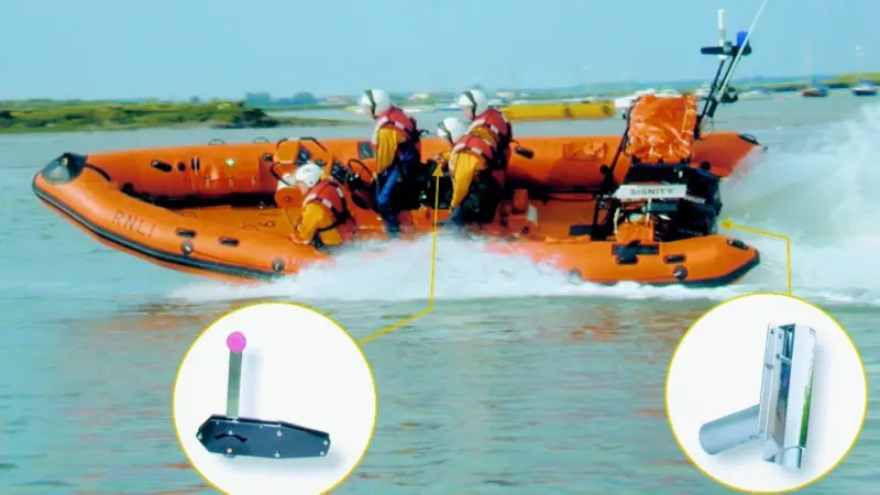 An RNLI Atlantic 75 RIB with detail of the control unit and ballast valve (on right).