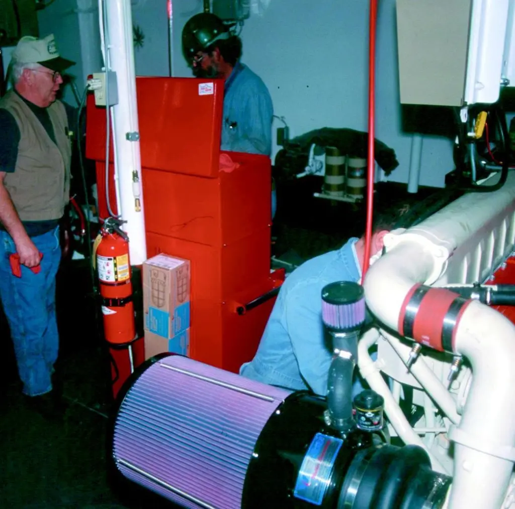 Tom Curry of Curry Marine in the engine room of a crabbing boat under construction in America.