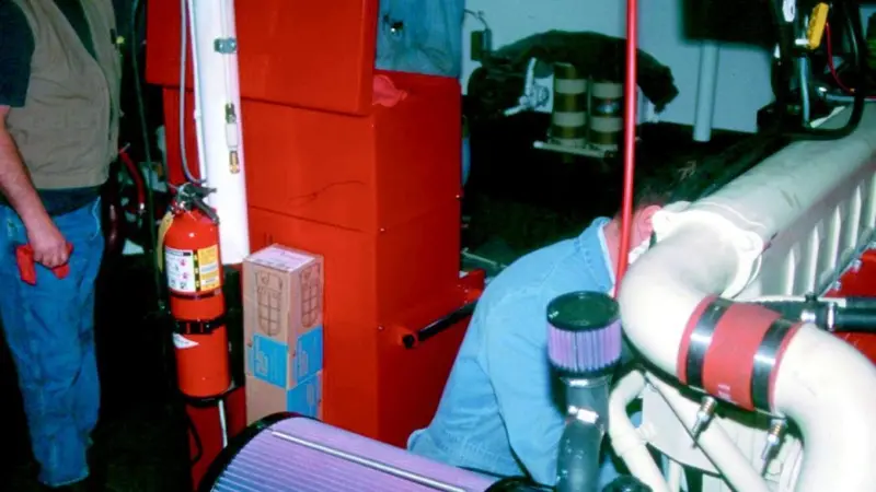 Tom Curry of Curry Marine in the engine room of a crabbing boat under construction in America.