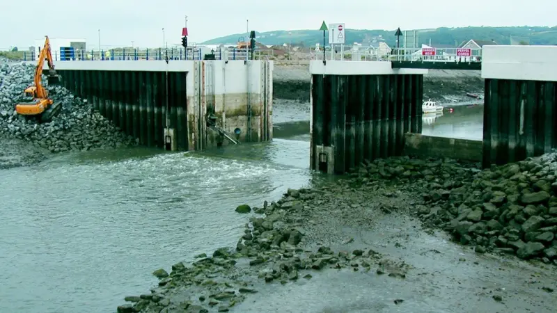 The new marina was created by impounding the harbour at Burry Port with new walls and a 14m wide impounding gate.
