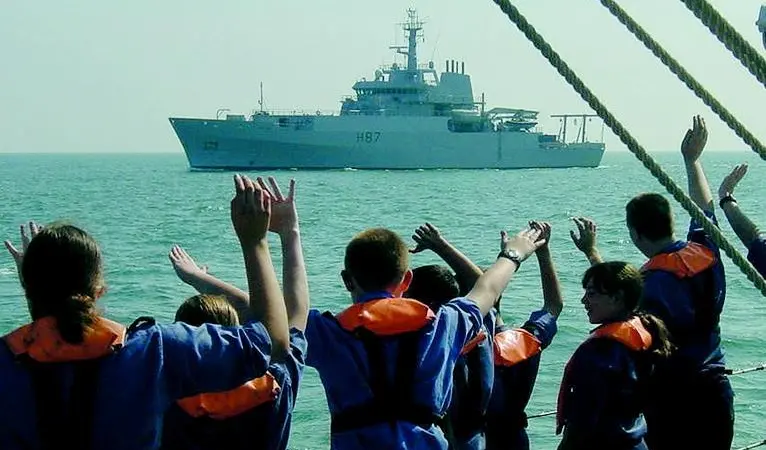 Sea Cadets aboard the former HMS Echo greet the recently commissioned namesake off Portsmouth.