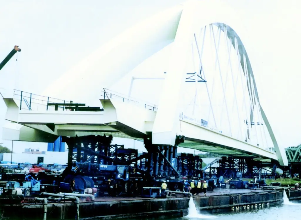 Smits floating sheerlegs Taklift 3 installing a section of the Moerdijk Bridge.