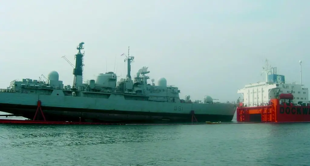 HMS Nottingham secured on the deck of MV Swan in Sydney Harbour before the start of the long voyage home.
