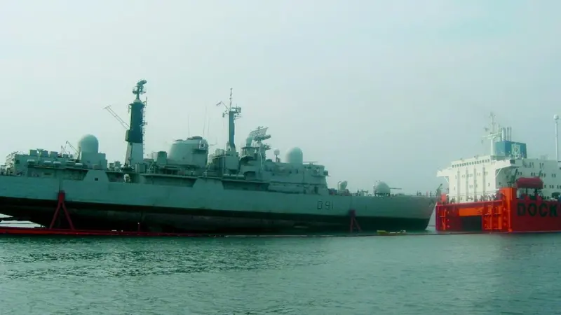 HMS Nottingham secured on the deck of MV Swan in Sydney Harbour before the start of the long voyage home.