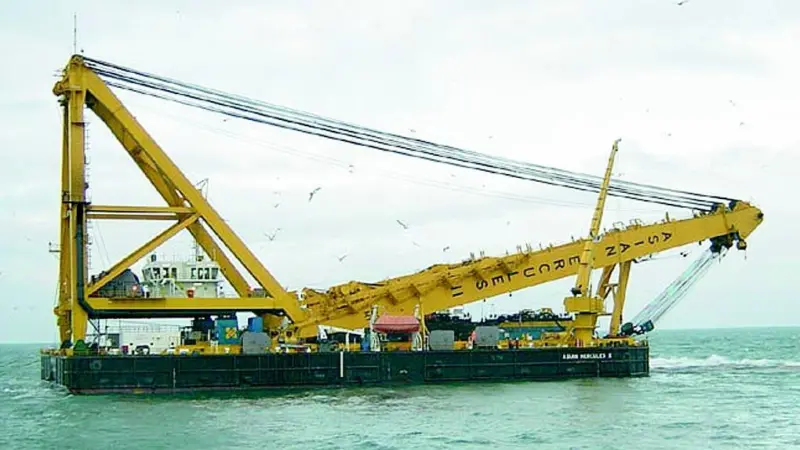 The SMIT Salvage vessel Asian Hercules II in position to receive fuel bunkers from the sunken car carrier Tricolor.