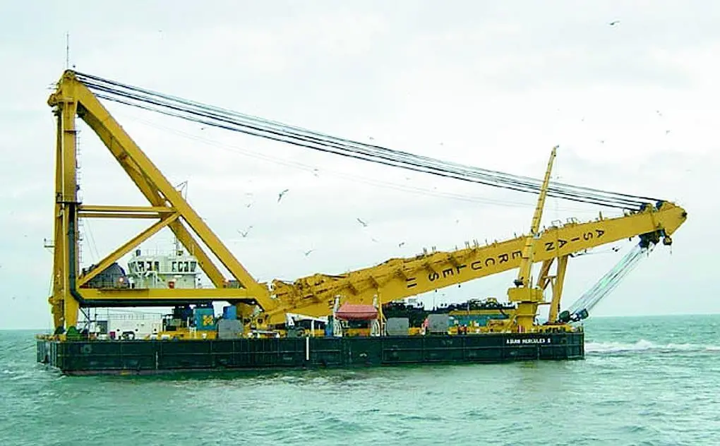 The SMIT Salvage vessel Asian Hercules II in position to receive fuel bunkers from the sunken car carrier Tricolor.