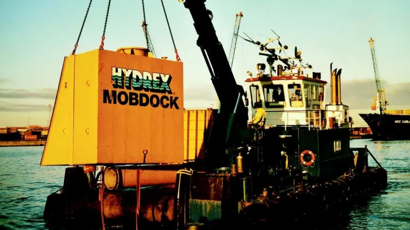 Mobdock being lowered into water.