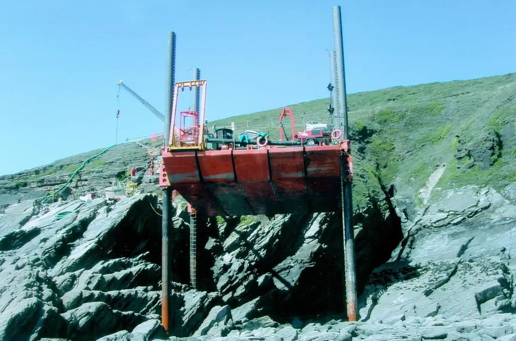 Photo: Seacores Skate IIE jack-up positioned to provide access to pipeline on the steep cliffs of North Devon.