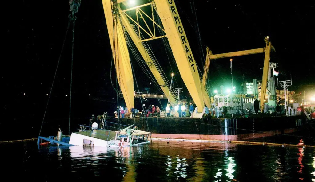 The Cormorant raises the sunken tug from the depths of Antwerp Harbour.