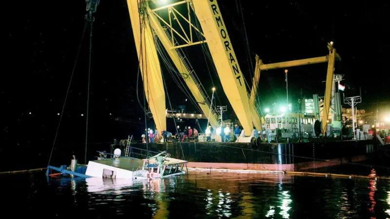 The Cormorant raises the sunken tug from the depths of Antwerp Harbour.