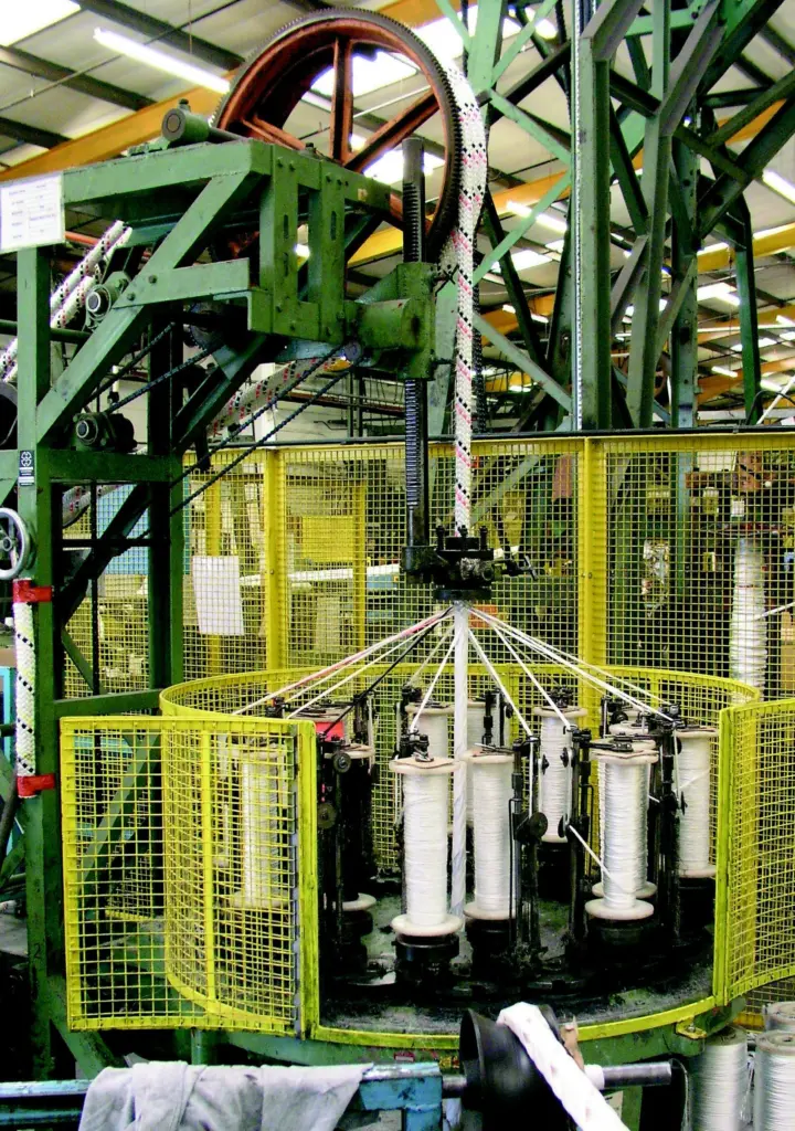 A tough outer jacket is woven onto a Steelite rope during manufacture at the Marlow works.