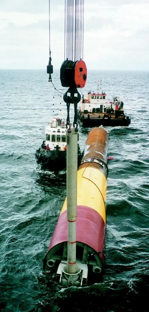 The monopiles are towed out to Excalibur and attached to the crane with a special male to female spear and latching system prior to a buoyant lift into the vertical.