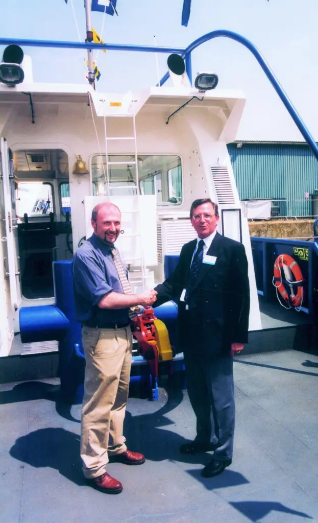 The Farset of Belfast was handed over by VT Halmatics Ian Strugnell (right) to Justin Ferran at seawork2003