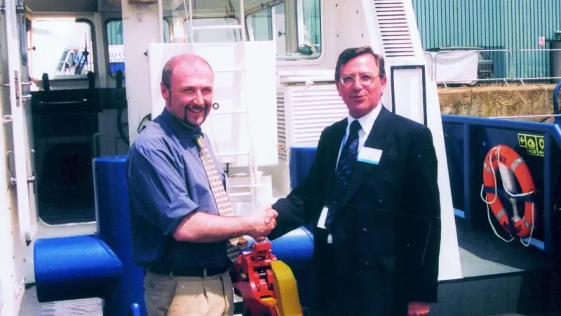 The Farset of Belfast was handed over by VT Halmatics Ian Strugnell (right) to Justin Ferran at seawork2003
