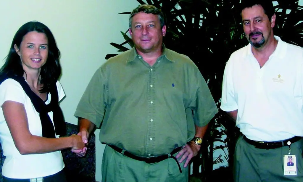 Nicki Jones, Vessel Support Manager of Veritas DGS, with Steve Browne of Thales GeoSolutions Inc and Richard Price of Veritas DGS following signing of an agreement under which Thales GeoSolutions is to provide the US-based company with SkyFix-XP...