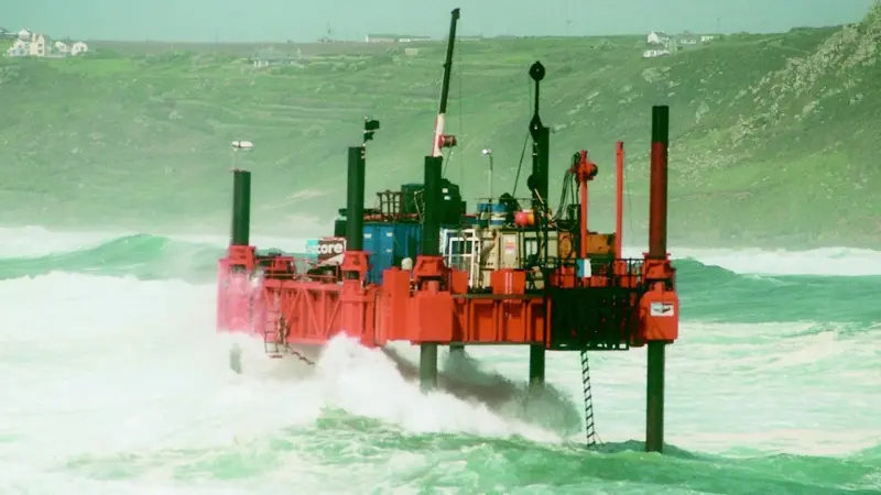 A Seacore Seawalker is seen working on the lifeboat station at Sennen Cove UK in conditions similar to those on the west coast of Africa.