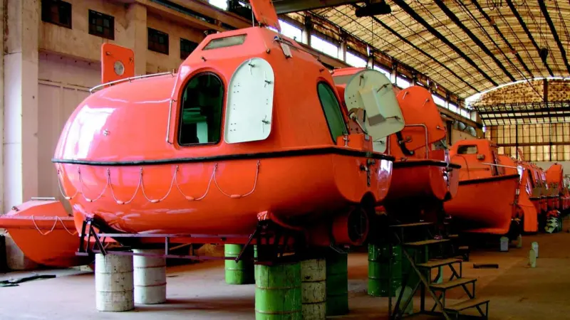 Lifeboats manufactured in China await delivery to European markets.