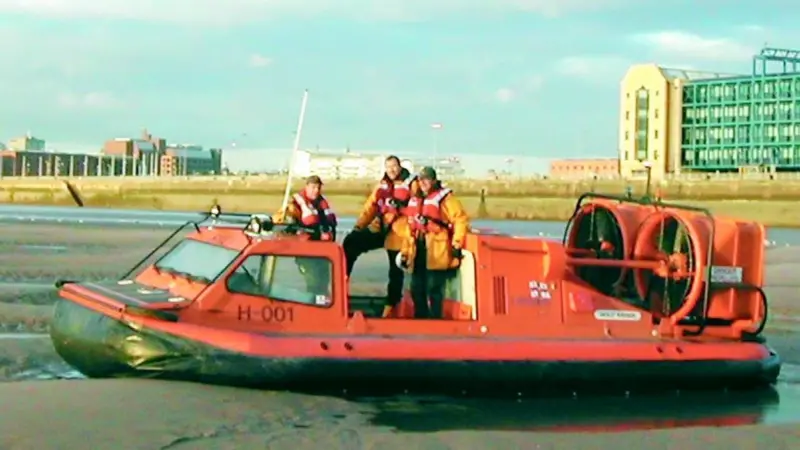 One of the RNLIs Search and Rescue Griffon hovercraft demonstrates its versatility in the Port of Liverpool.