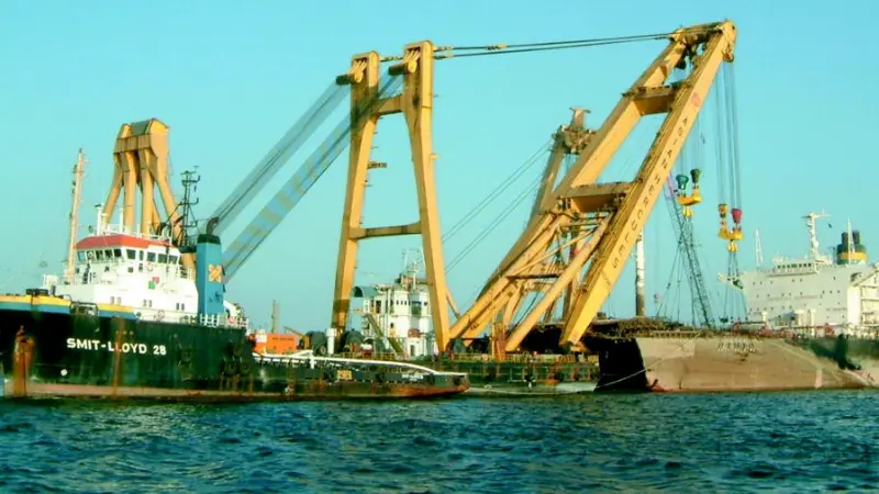 The aft section of Tasman Spirit is readied for removal.