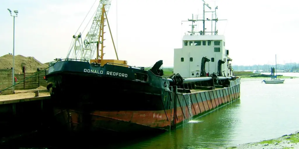 Bow and error. The Donald Redford alongside the Lafarge Aggregates yard on Fareham Creek earlier this month.