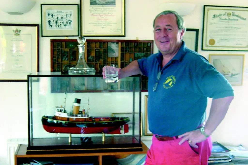 Mr Allan Brunton-Reed with the tug model presented to him at ITS.