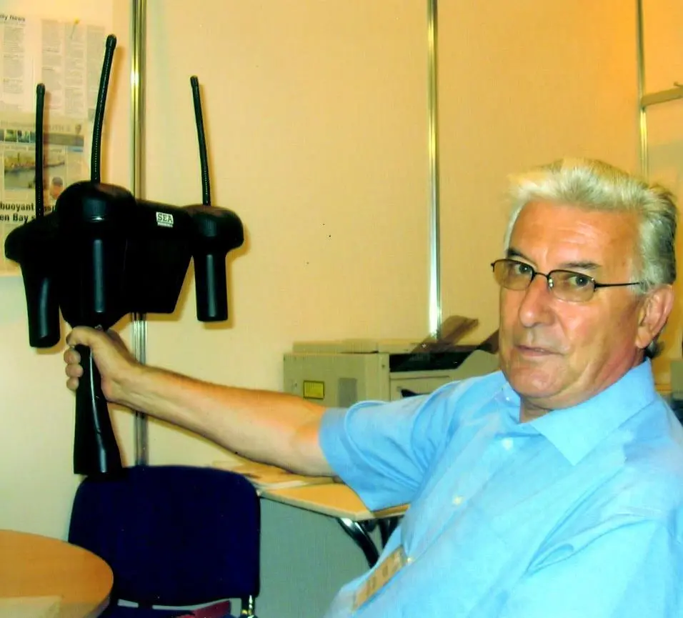 Marine Rescue Technologies chairman David Marshall shows the first Sea Marshall SARfinder hand portable direction finder in the seawork2004 press office.