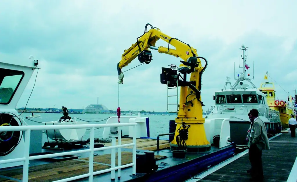 Amco Vebas VR 36 model crane is seen on board the 14.5m steel multicat Seaboard Constructor at seawork2004.