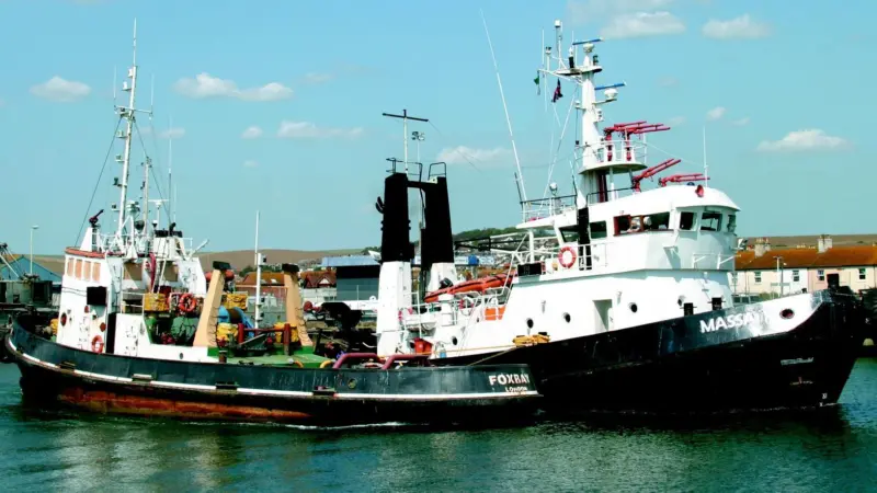 Massai prepares to leave Newhaven with Foxhound in tow.