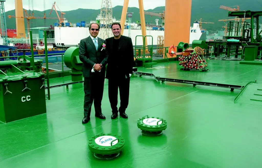 Fabio Montanari, CEO of Navigazione Montanari and Jean-Luc Dabi, CEO of the JLMD Ecologic Group and inventor of the JLMD system, are seen on board Montanaris new ship Valtamed with system caps in the foreground.
