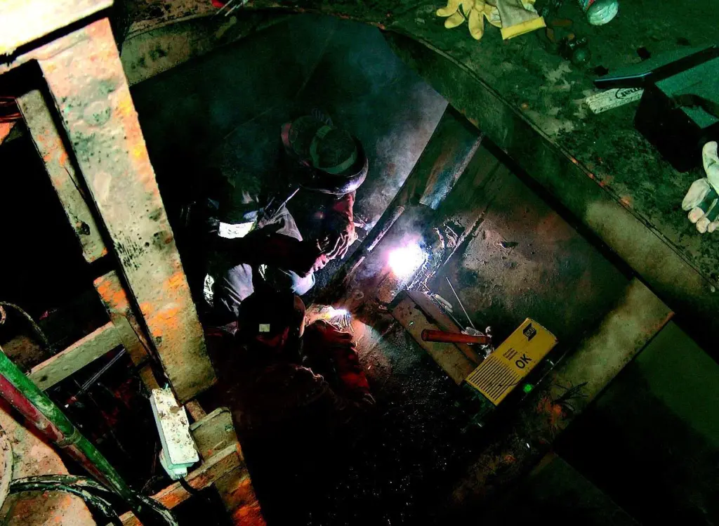 Welding underway in the vessels ballast tank.