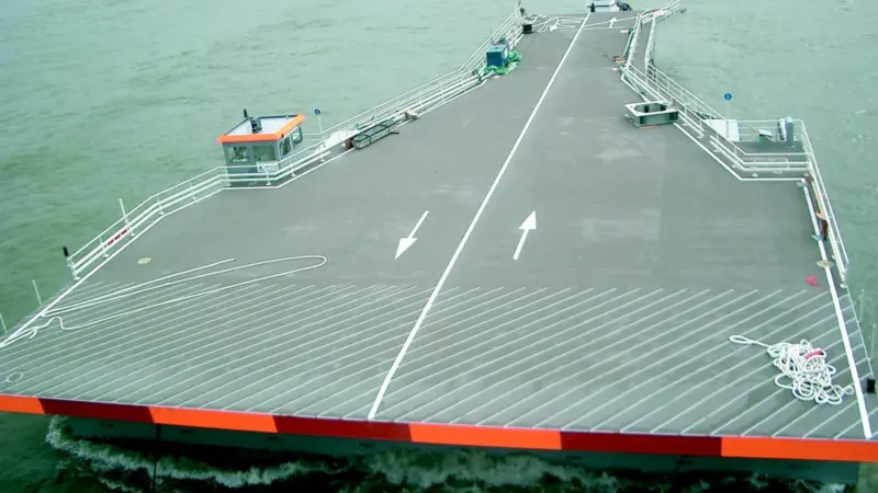 Ravesteins linkspan for the Port of Dunkirk is seen under tow.