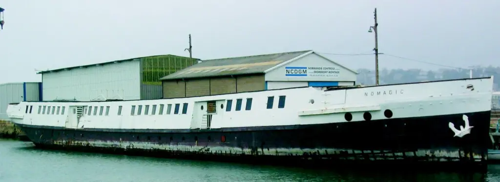 The S/S Nomadic is seen alongside in Le Havre on New Years Day 2005. Photo courtesy of Thierry Dufournaud of the French Titanic Society.