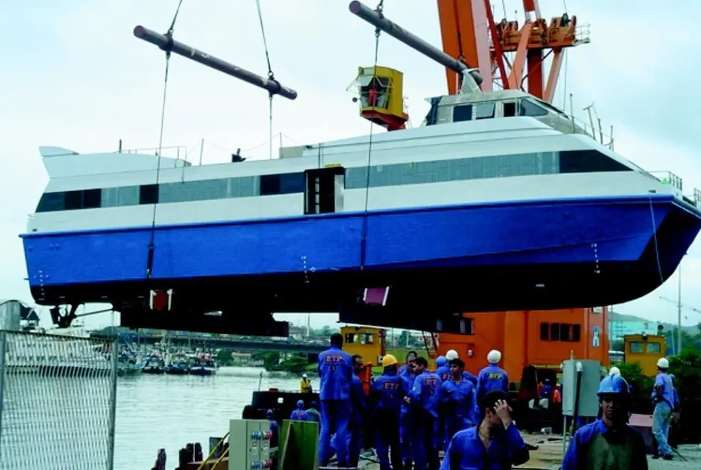 The first of three 29m City Cats is lowered into the water.
