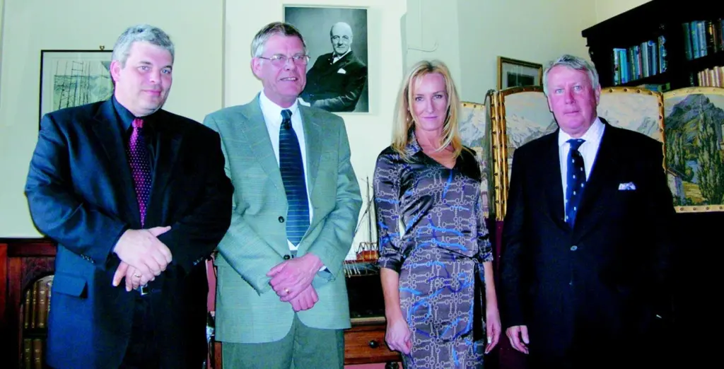 Seawork exhibition manager Jane Wilson earlier this month with (from left) John Miele, marketing director of Micad Marine, Eamon Baird, chief operating officer of PIMSIC Group, and David Boorman, director of PIMSIC. The setting is the library of...