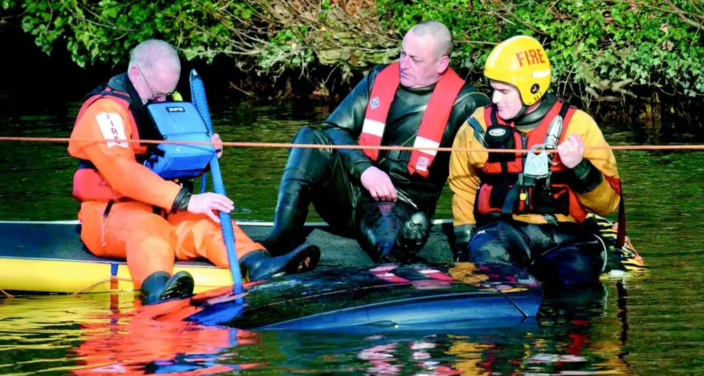 The SCUBAR Underwater Scope is deployed by Berkshire Fire and Rescue Services searching for bodies in a car which has crashed into a canal.