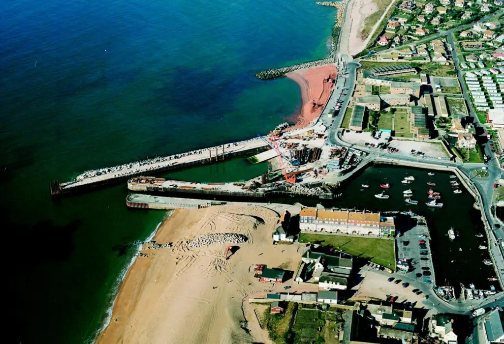 Costains work at West bay included a new West Arm,  and work on the existing, Grade II listed East Pier.