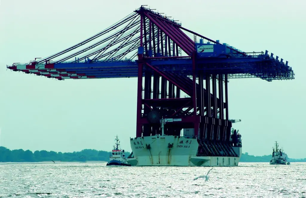 The five giant container cranes arrive at Eurogate Container Terminal Hamburg last month. Photo: Achim van Gerven.