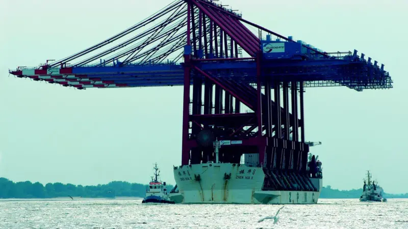 The five giant container cranes arrive at Eurogate Container Terminal Hamburg last month. Photo: Achim van Gerven.