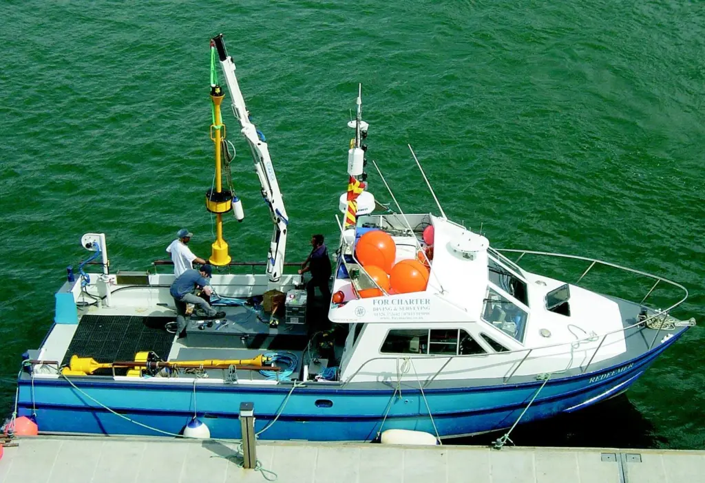 Redeemers powerful deck crane made easy work of deploying the buoys used during the trials.